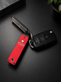 ROKEY red key organiser with car key and keys on a dark surface