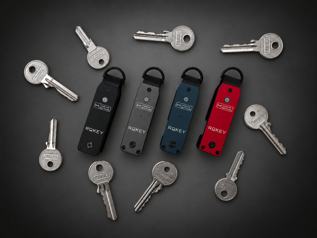Four Rokey key organisers with keys on a charcoal grey background